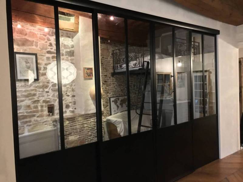 Verrière intérieure coulissante séparation séjour chambre dans Lyon