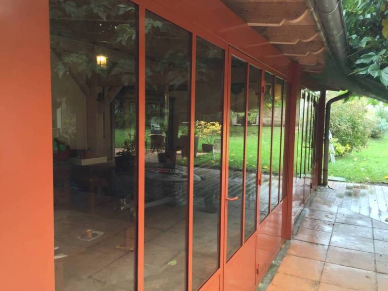 Véranda en acier pour séparer un garage à Bron