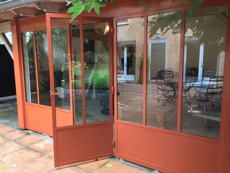 Véranda en acier pour séparer un garage à Bron