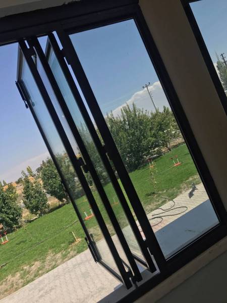 Menuiserie acier avec fenêtres en accordéon à Annecy en Rhône Alpes