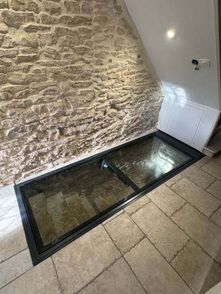 Fabrication d’une trappe de cave vitrée motorisée à Bourgoin-Jallieu (Isère)