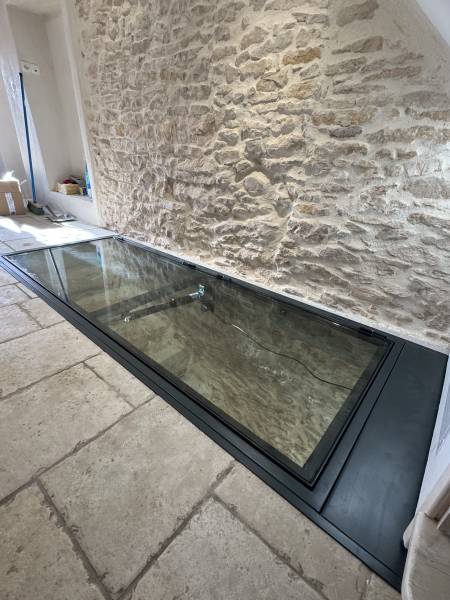 Fabrication d’une trappe de cave vitrée motorisée à Bourgoin-Jallieu (Isère)