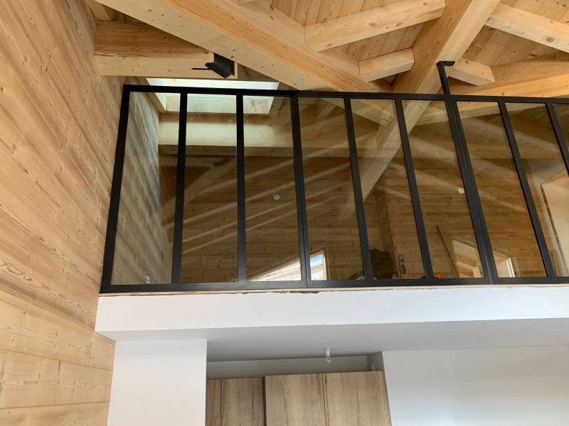 Verrière intérieure sur mezzanine à Courchevel